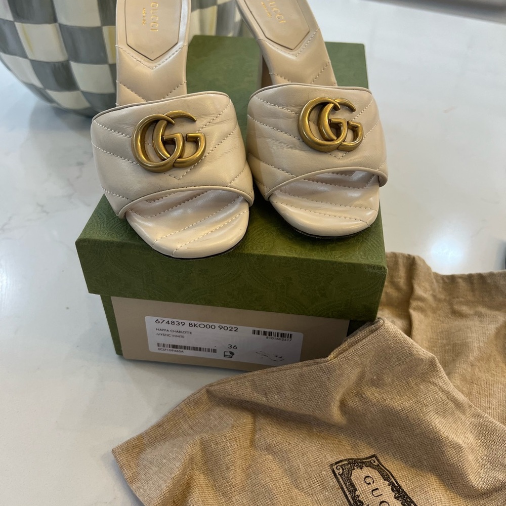 Gucci Women's Cream Mules with Gold Logo